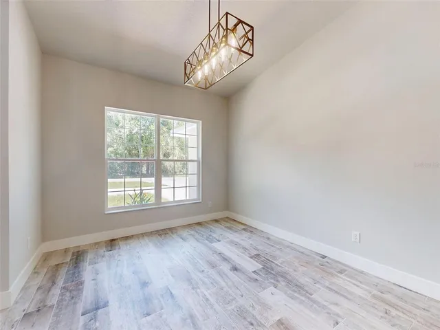 a bathroom with a sink a washer and dryer