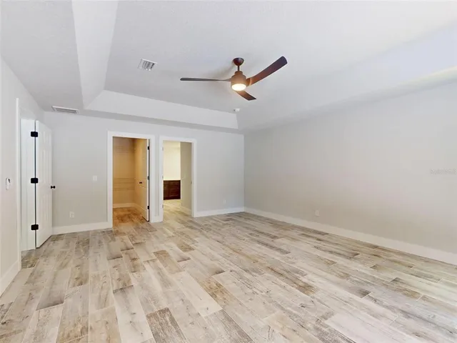 a view of an entryway with a floor to ceiling window