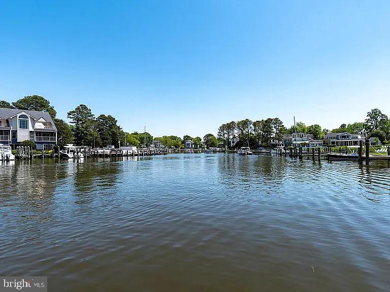 104 East Maple Avenue St. Michaels, MD 21663 - Photo 13 of 14 a view of a lake with houses