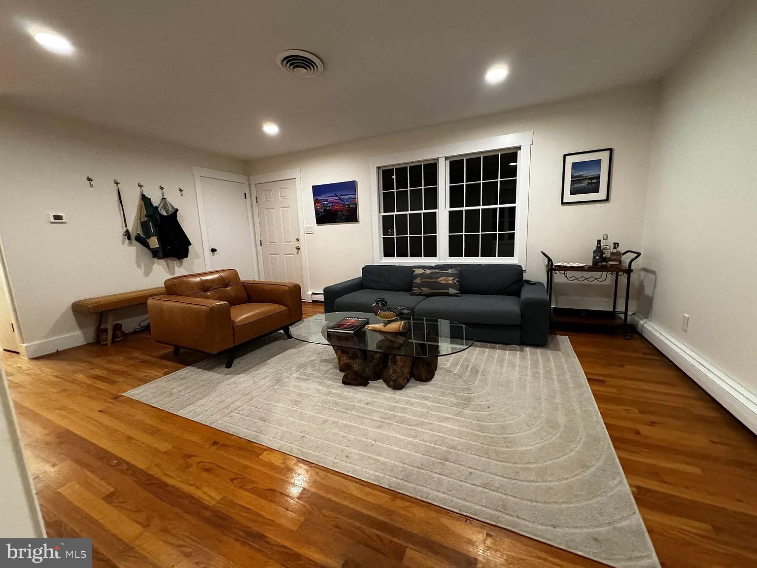 104 East Maple Avenue St. Michaels, MD 21663 - Photo 3 of 14 a living room with furniture and a window