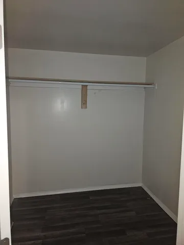 a bathroom with a sink a toilet and window