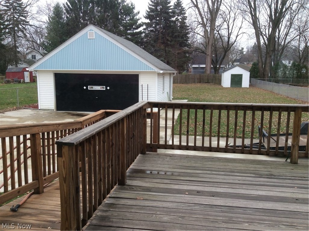 39022 Johnnycake Ridge Road Willoughby, OH 44094 - Photo 17 of 22 Wood deck with ramp. 2 car garage garage. New storage shed. Big backyard.