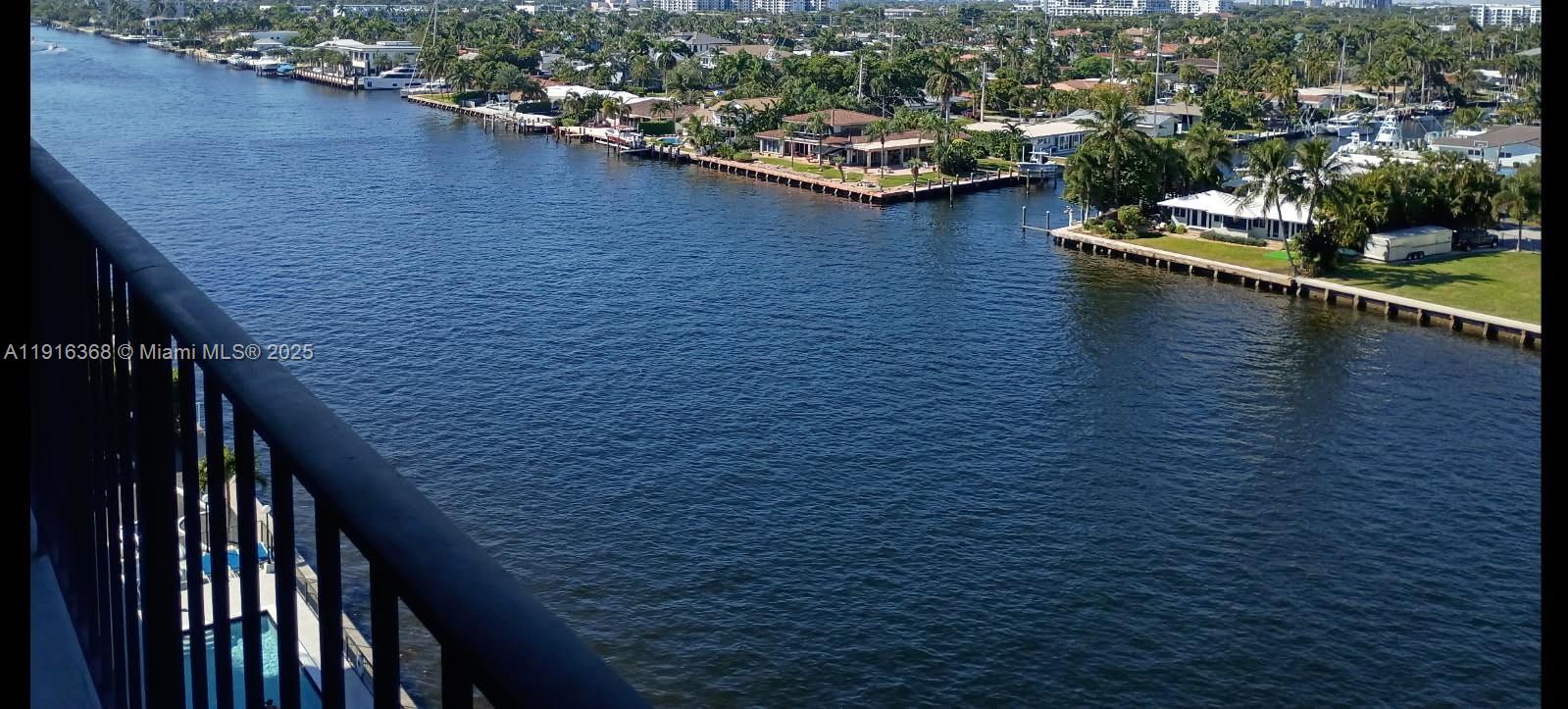 521 North Riverside Drive, Unit 907 Pompano Beach, FL 33062 - Photo 2 of 23 an aerial view of residential houses with outdoor space