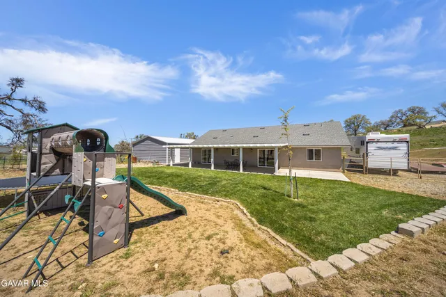 a front view of house with yard