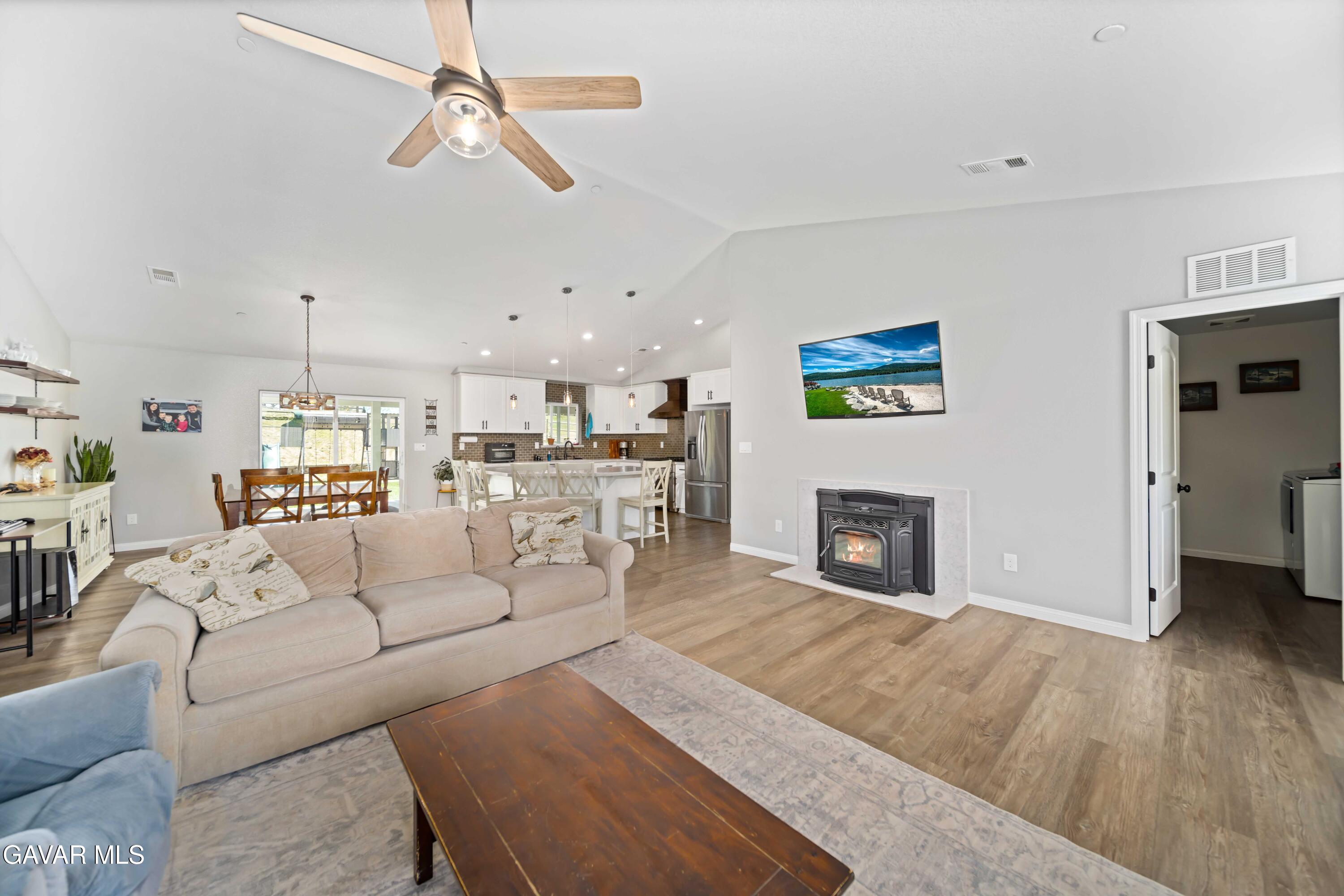 29990 Horsethief Drive Tehachapi, CA 93561 - Photo 7 of 29 a living room with furniture and a fireplace