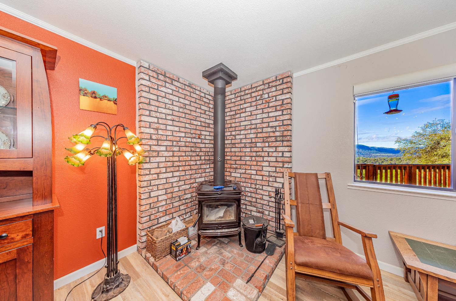 40733 Big Oak Flat Road North Oakhurst, CA 93644 - Photo 19 of 73 a bathroom with a sink a mirror and a potted plant