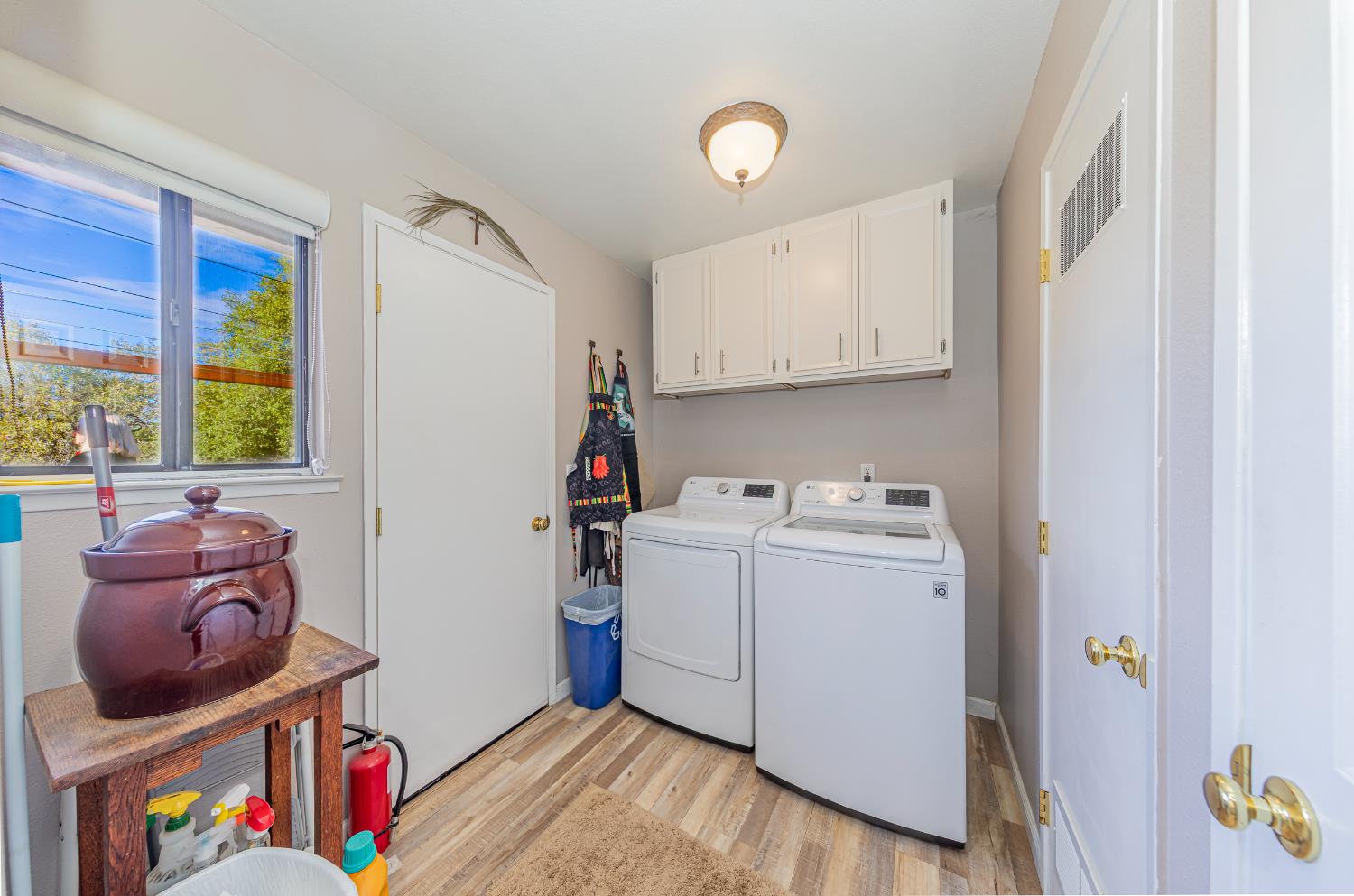 40733 Big Oak Flat Road North Oakhurst, CA 93644 - Photo 21 of 73 a storage room with washer and dryer