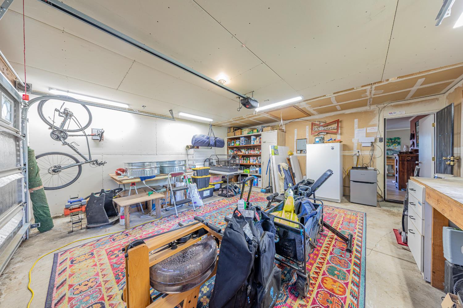 40733 Big Oak Flat Road North Oakhurst, CA 93644 - Photo 34 of 73 a bed room with a bed and a desk