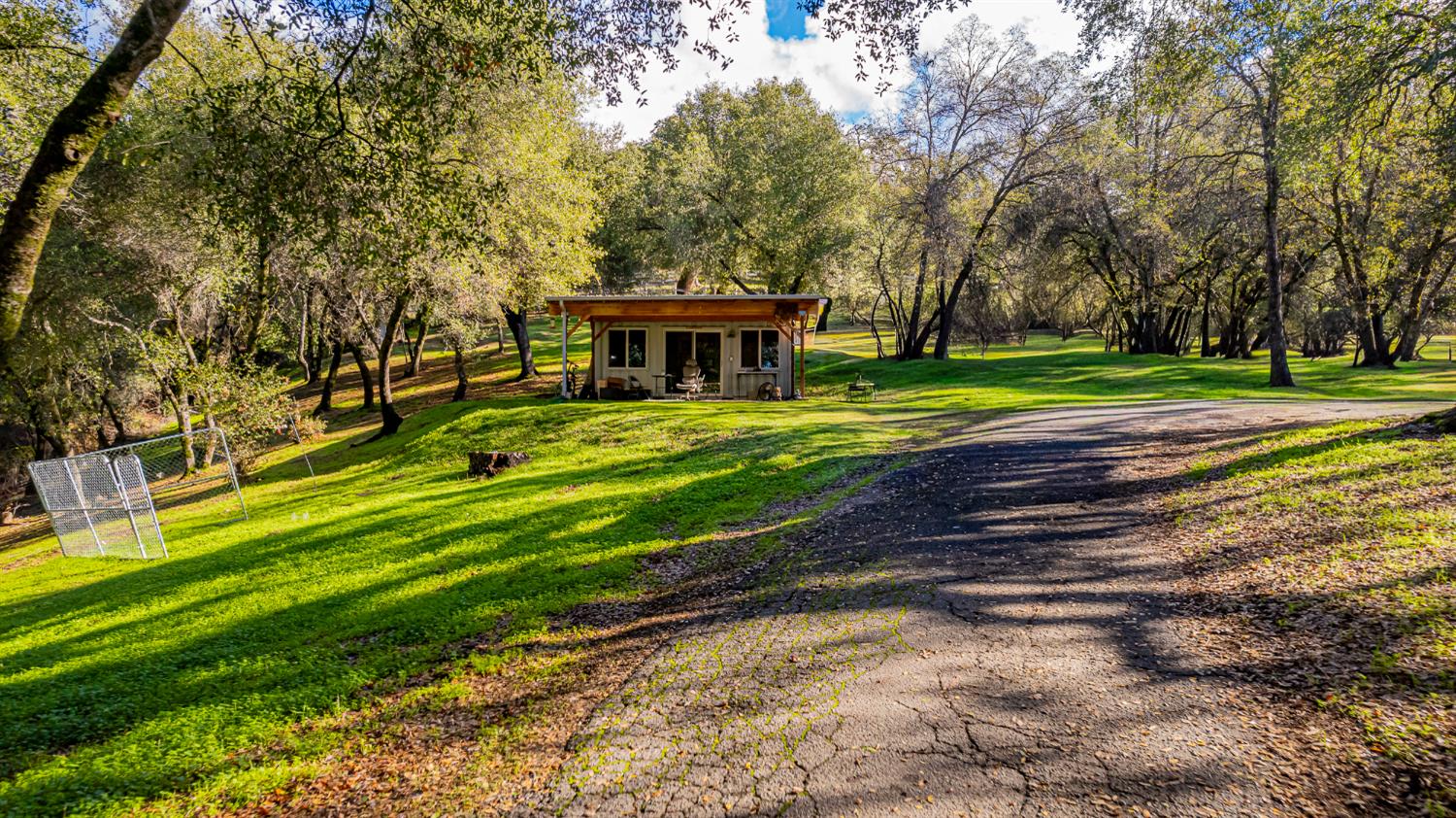 40733 Big Oak Flat Road North Oakhurst, CA 93644 - Photo 64 of 73 a view of a house with a big yard