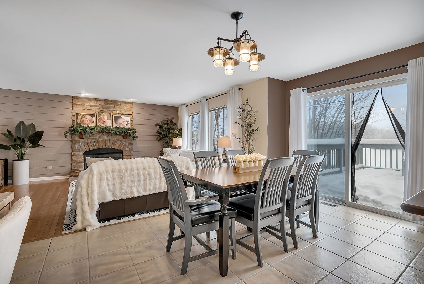 300 Wabena Court Minooka, IL 60447 - Photo 25 of 71 a view of a dining room with furniture a chandelier and wooden floor