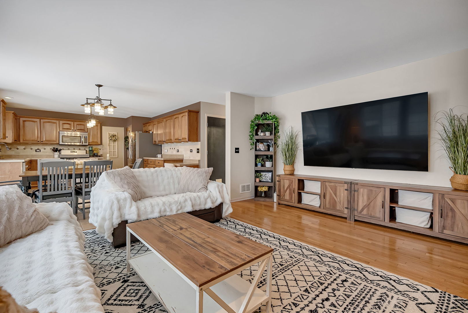 300 Wabena Court Minooka, IL 60447 - Photo 29 of 71 a living room with furniture and a flat screen tv