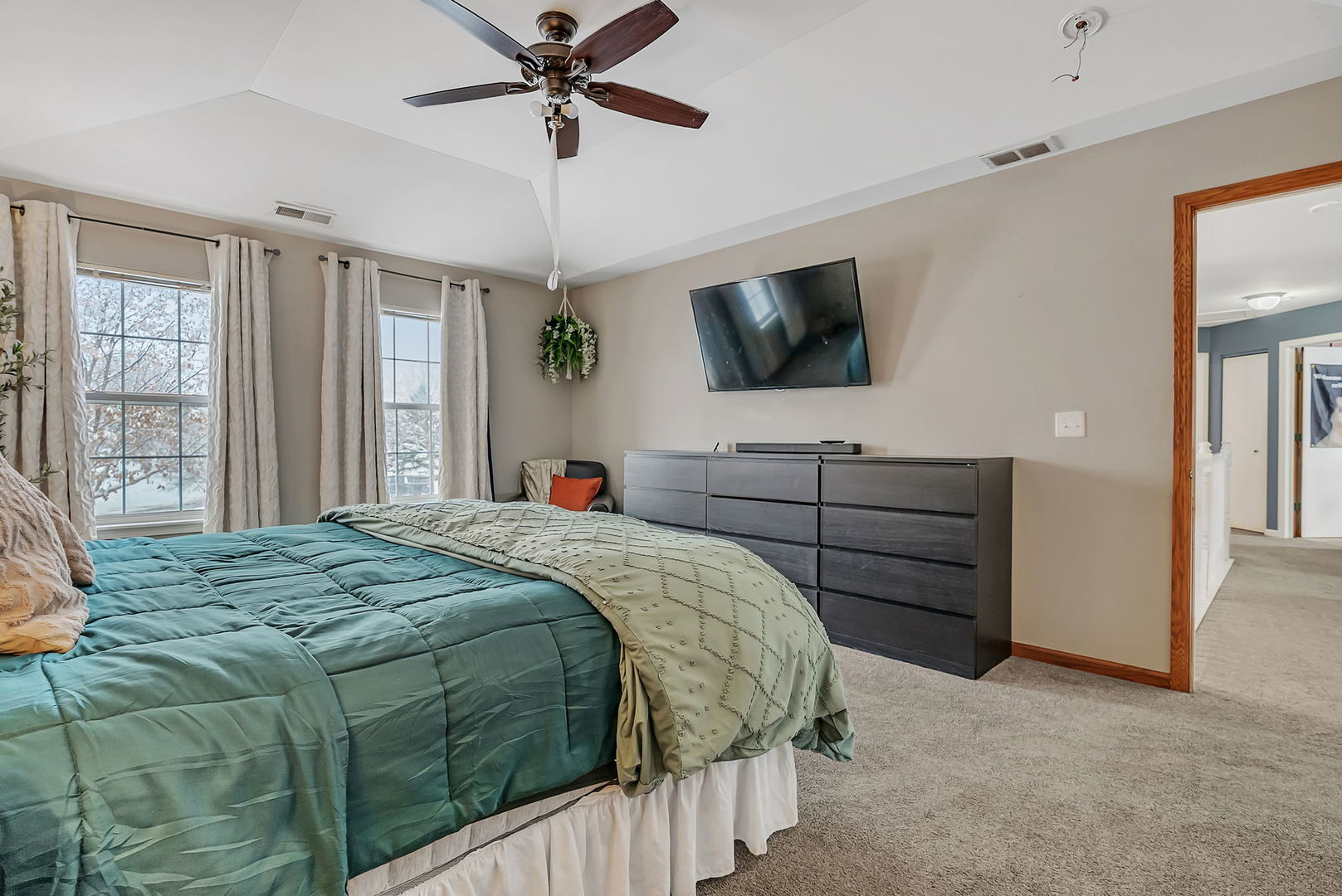 300 Wabena Court Minooka, IL 60447 - Photo 38 of 71 a bedroom with a bed and a flat screen tv