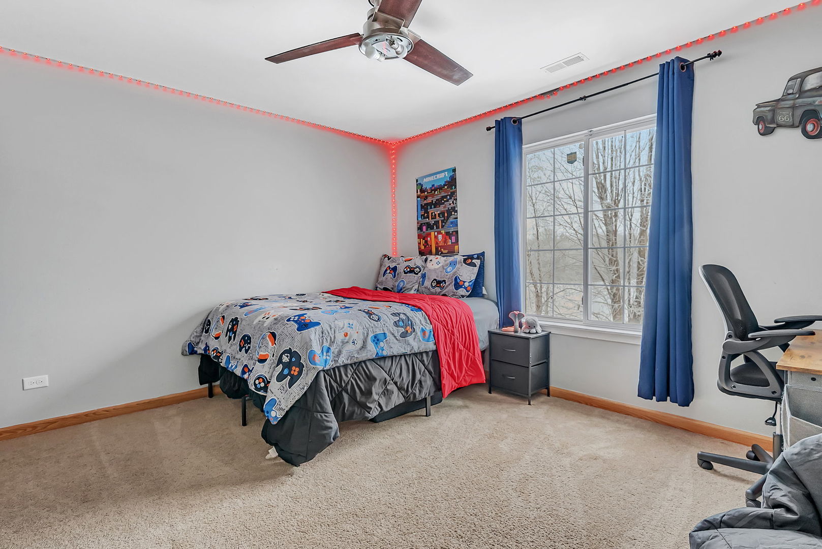 300 Wabena Court Minooka, IL 60447 - Photo 45 of 71 a bedroom with a bed a desk and chair with the bookshelf