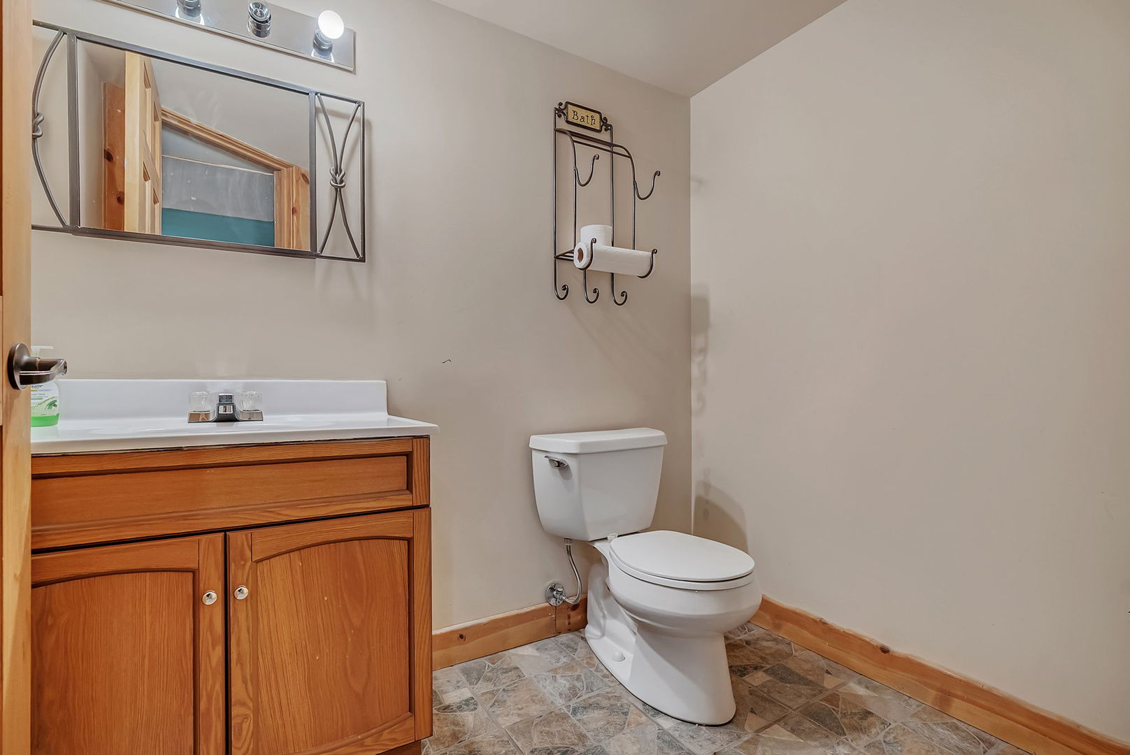 300 Wabena Court Minooka, IL 60447 - Photo 49 of 71 a bathroom with a toilet sink and mirror