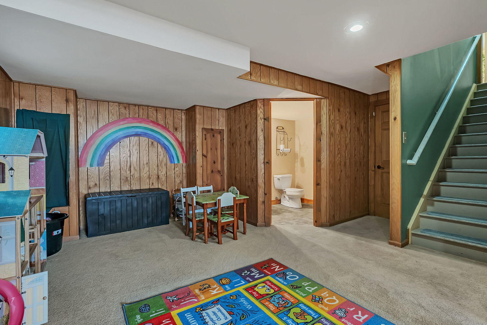 300 Wabena Court Minooka, IL 60447 - Photo 51 of 71 a living room with furniture and a baby crib