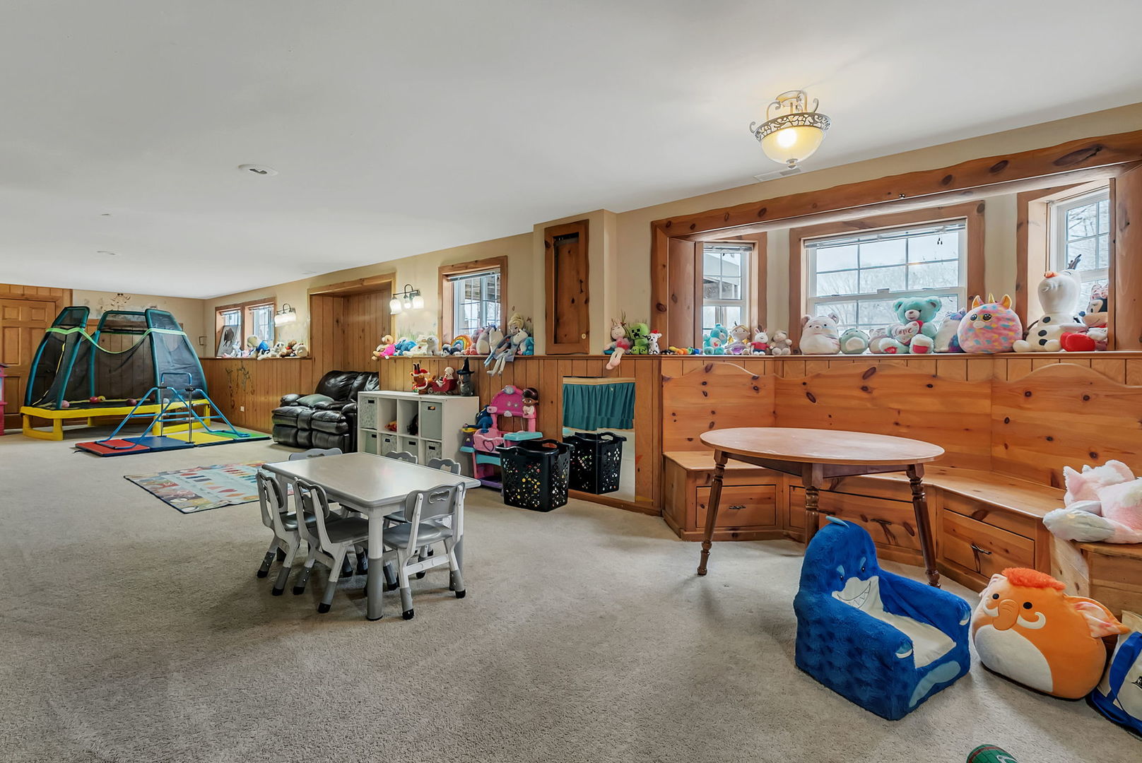 300 Wabena Court Minooka, IL 60447 - Photo 52 of 71 a living room with furniture and a large window