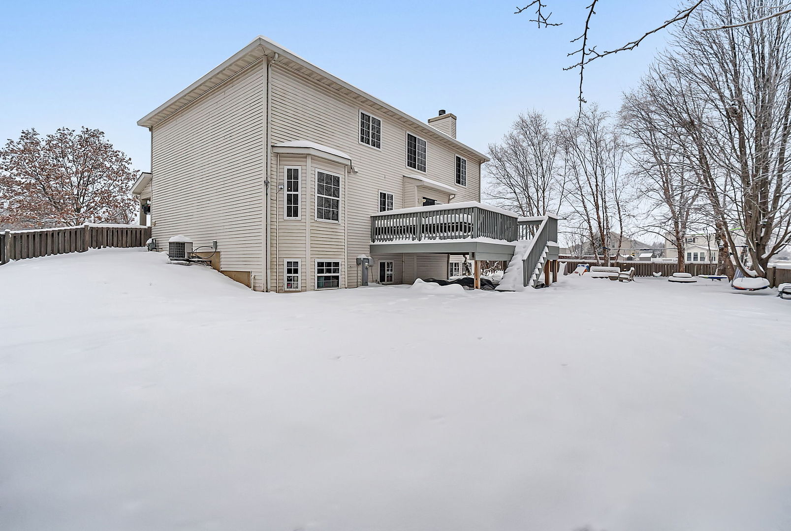300 Wabena Court Minooka, IL 60447 - Photo 62 of 71 a view of a house with a snow in the yard