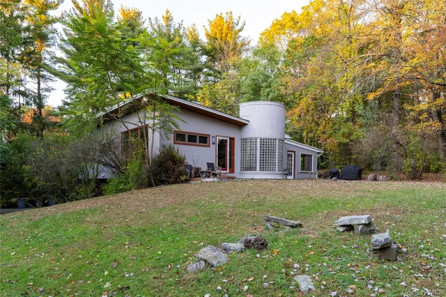 a picture of a bathroom with a shower