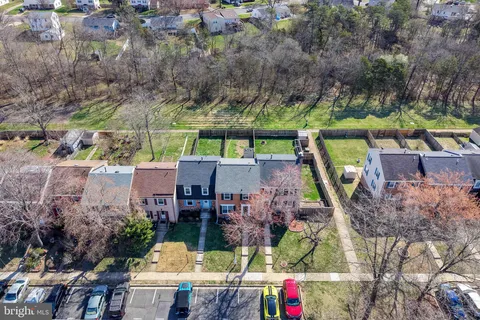an aerial view of houses and roads