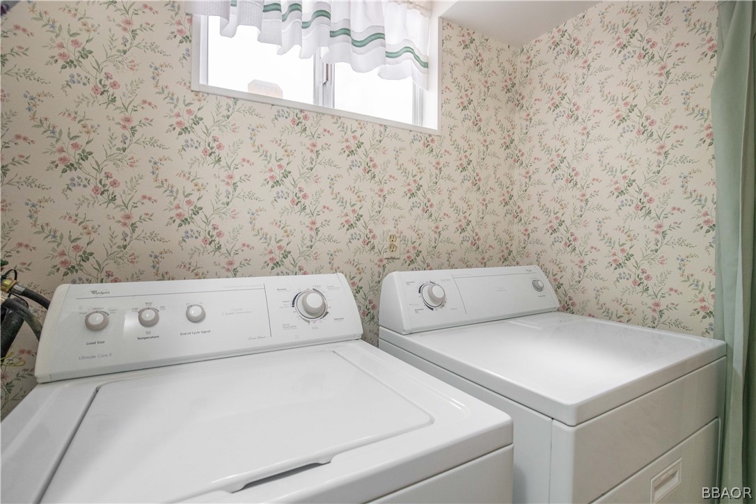 753 Maple Lane Sugarloaf, CA 92386 - Photo 32 of 42 a utility room with dryer and washer