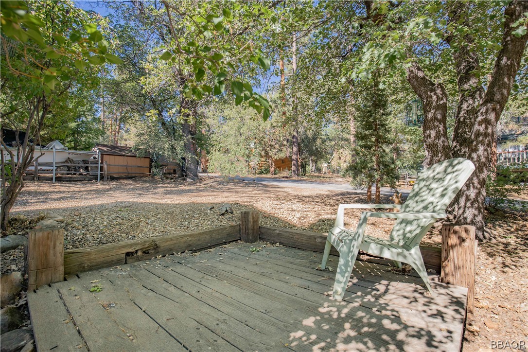 753 Maple Lane Sugarloaf, CA 92386 - Photo 4 of 42 a view of balcony with wooden floor and outdoor space