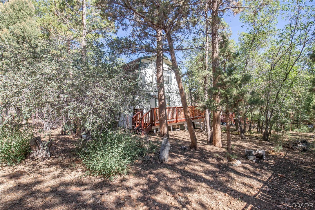 753 Maple Lane Sugarloaf, CA 92386 - Photo 41 of 42 a view of outdoor space with deck and trees