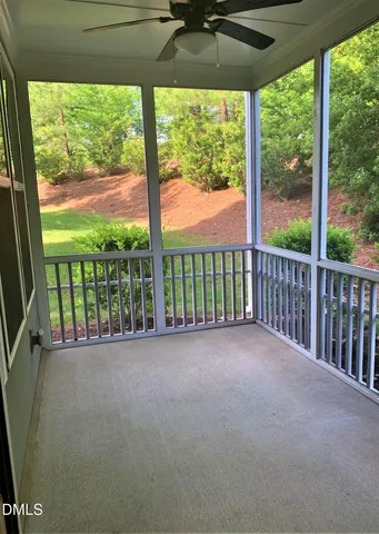 a view of a room with a large window