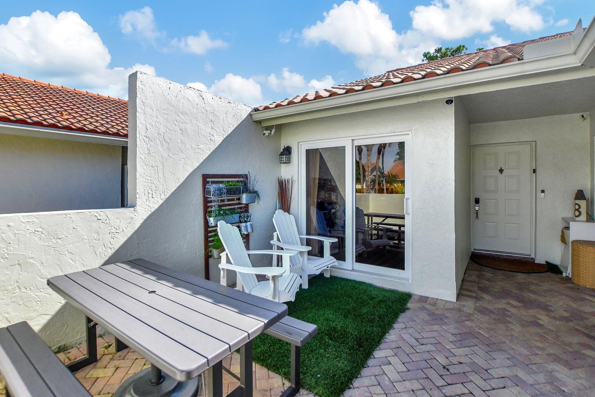 21596 Coronado Avenue Boca Raton, FL 33433 - Photo 3 of 41 FRONT COURTYARD
