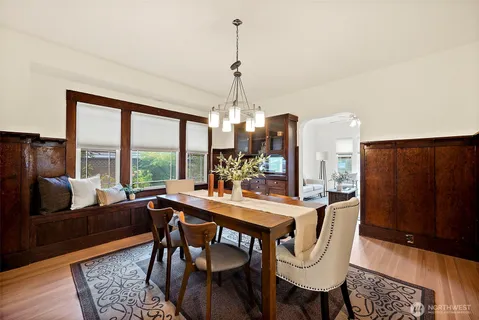 a view of a dining room with furniture window and outside view