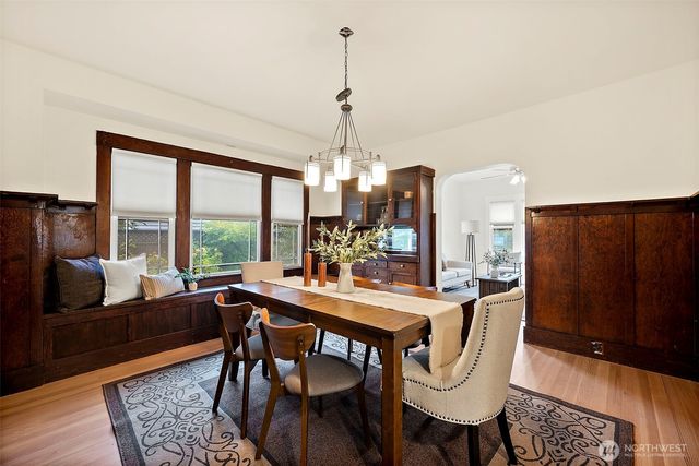 a view of a dining room with furniture window and outside view