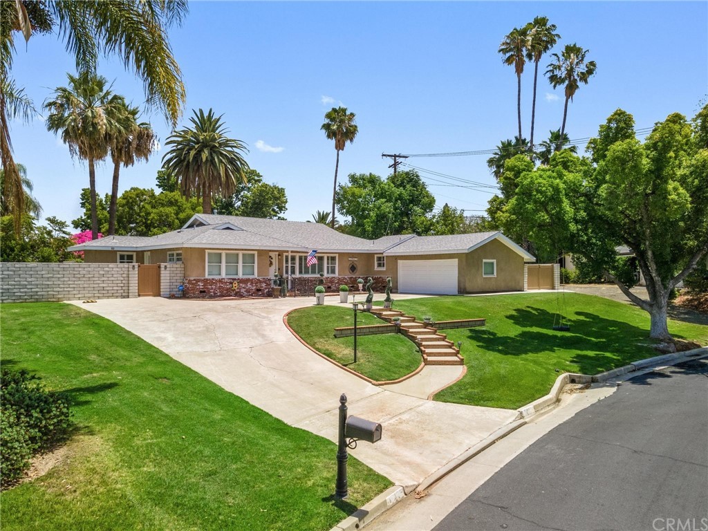 2321 Daventry Road Riverside, CA 92506 - Photo 1 of 1 a front view of a house with garden