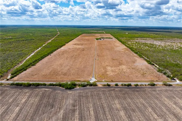 a view of a swimming pool with an outdoor space