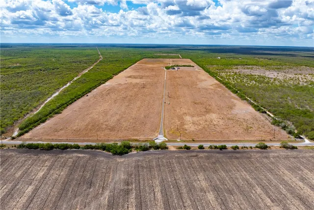 a view of a swimming pool with an outdoor space