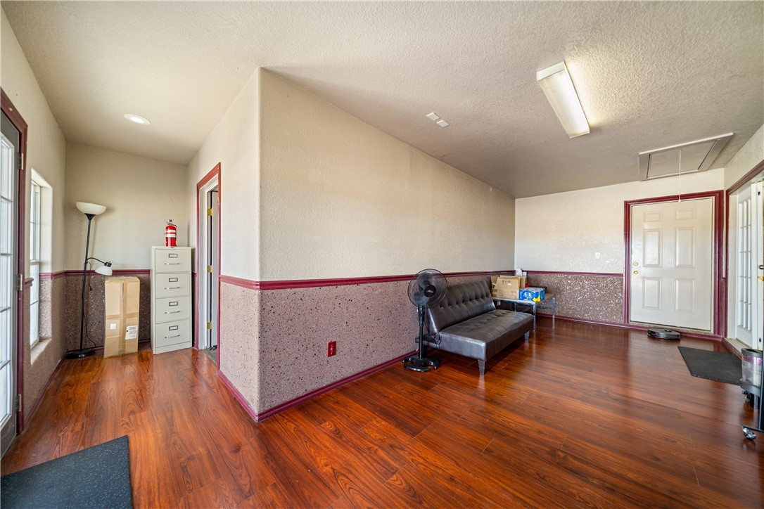 1777 County Road 170 Alice, TX 78332 - Photo 21 of 40 a living room with furniture and a wooden floor