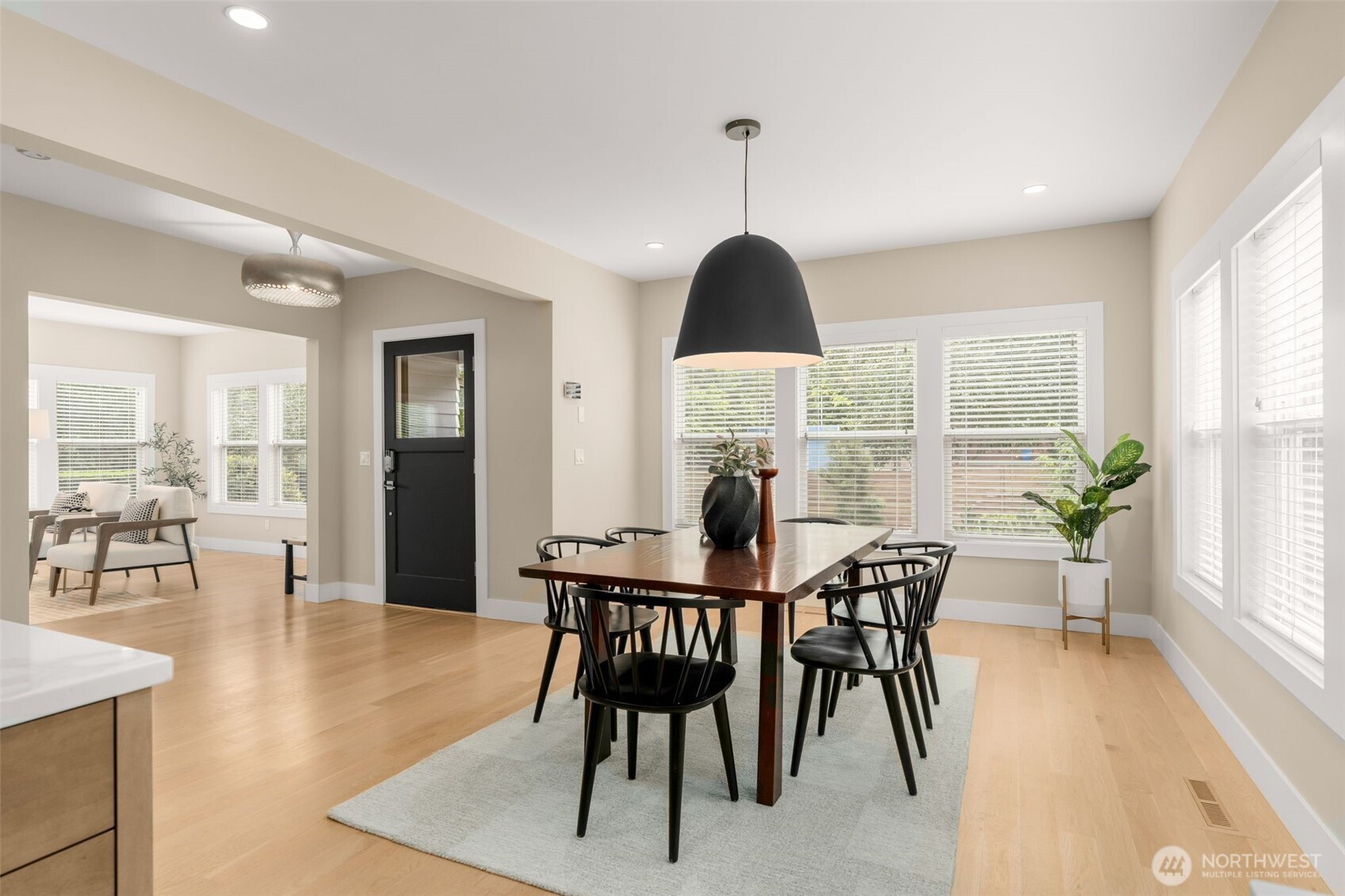 170 Lynn Street Seattle, WA 98109 - Photo 8 of 40 a view of a dining room with furniture window and wooden floor