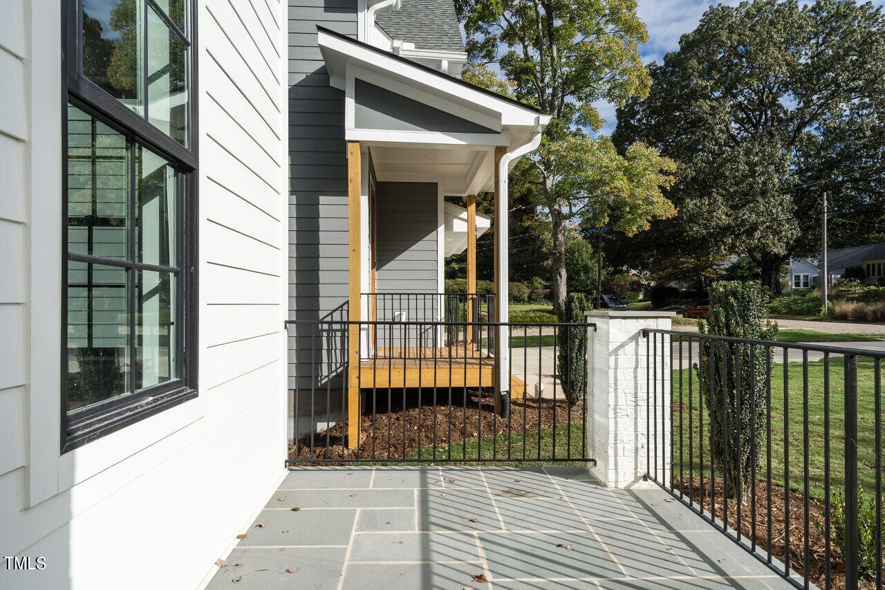 303 Shepherd Street Raleigh, NC 27607 - Photo 19 of 29 a view of a house with a balcony