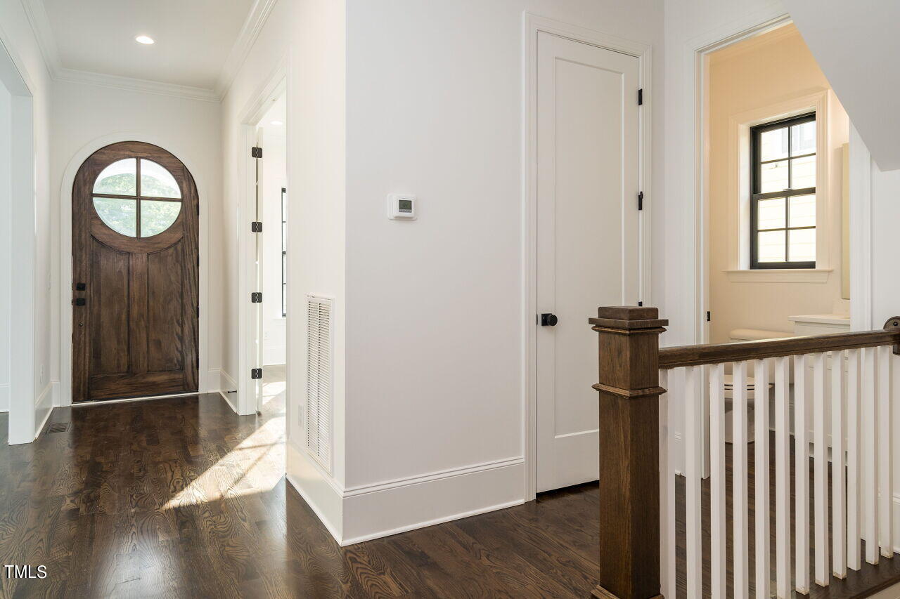 303 Shepherd Street Raleigh, NC 27607 - Photo 20 of 29 a view of a hallway with wooden floor