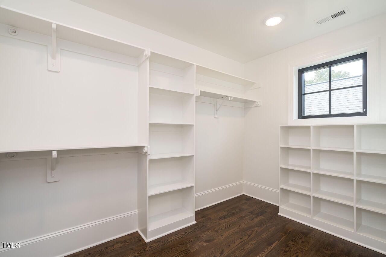 303 Shepherd Street Raleigh, NC 27607 - Photo 21 of 29 a view of a room with shelf