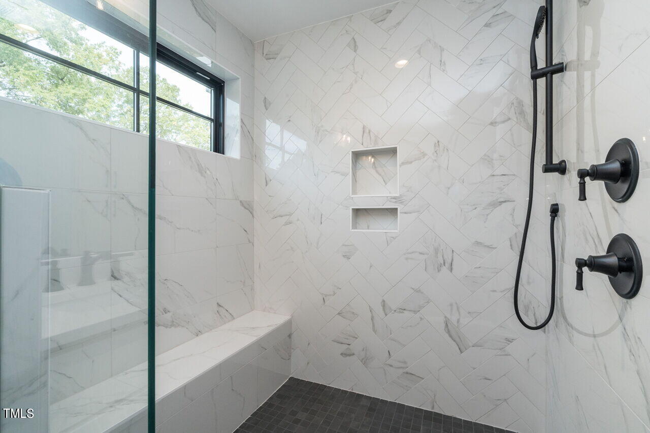 303 Shepherd Street Raleigh, NC 27607 - Photo 24 of 29 a bathroom with a shower