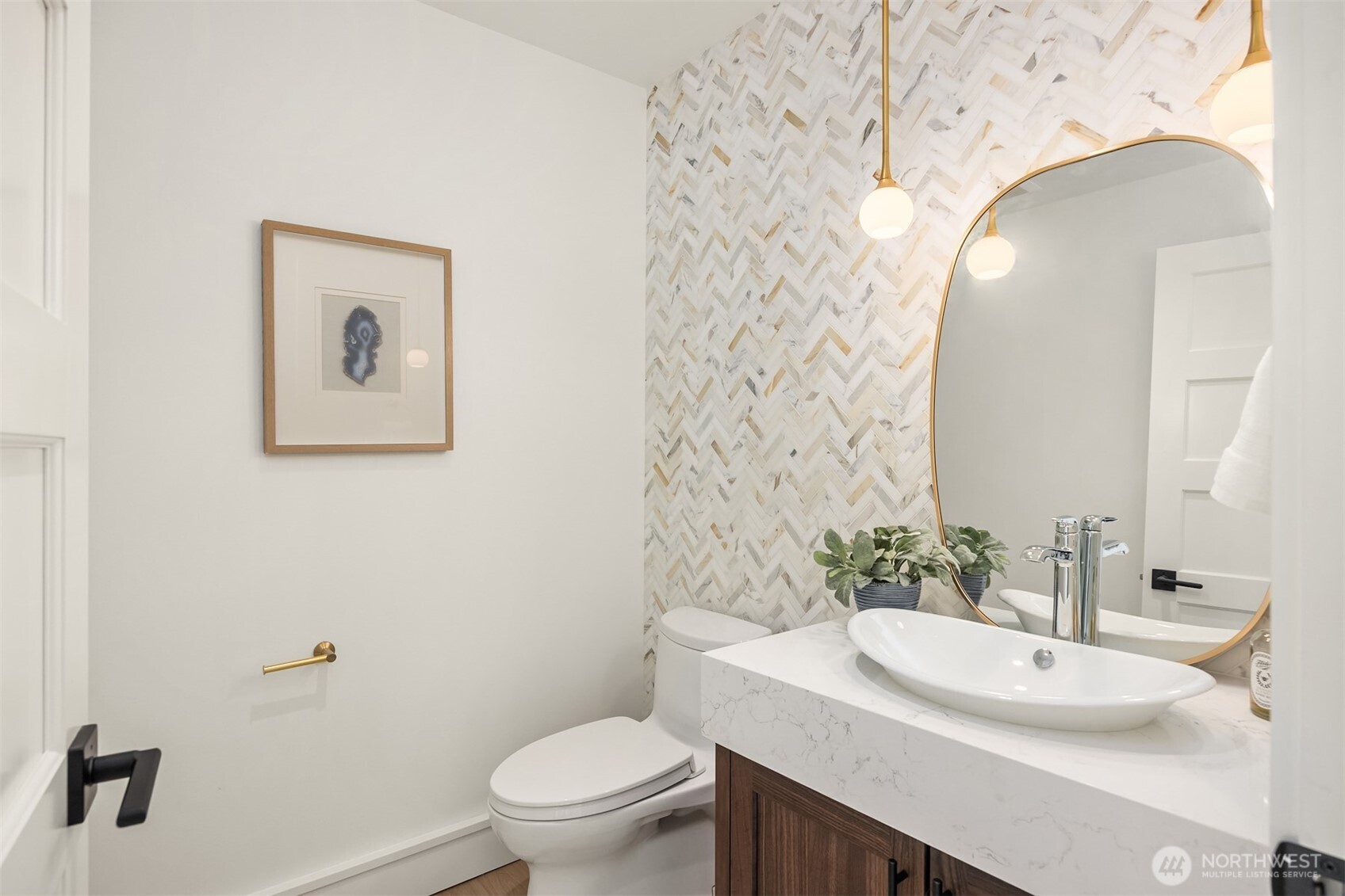 4869 Rosalind Road Northeast Bainbridge Island, WA 98110 - Photo 18 of 40 a bathroom with a sink and a mirror
