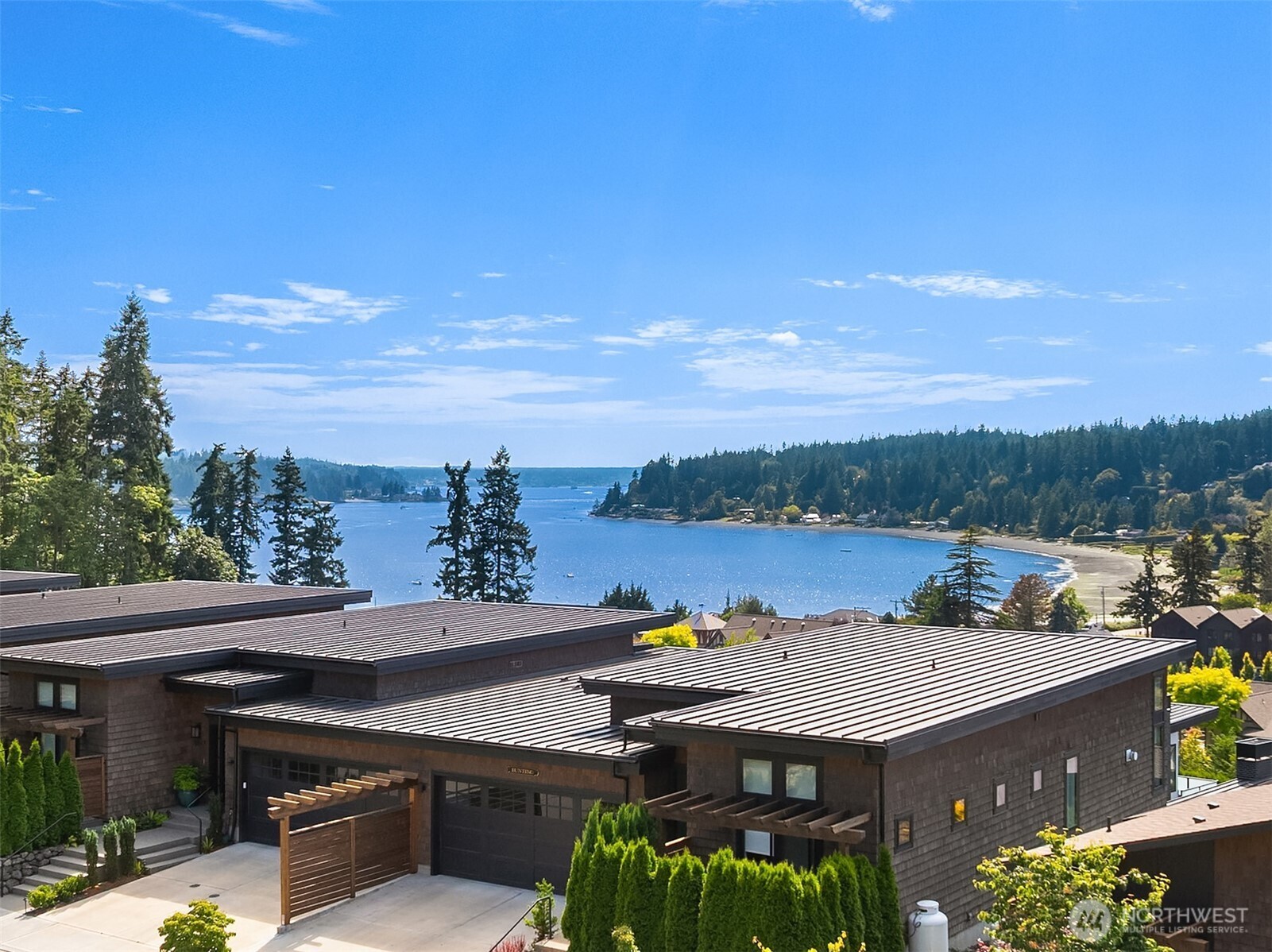 4869 Rosalind Road Northeast Bainbridge Island, WA 98110 - Photo 23 of 40 an aerial view of a house with a garden