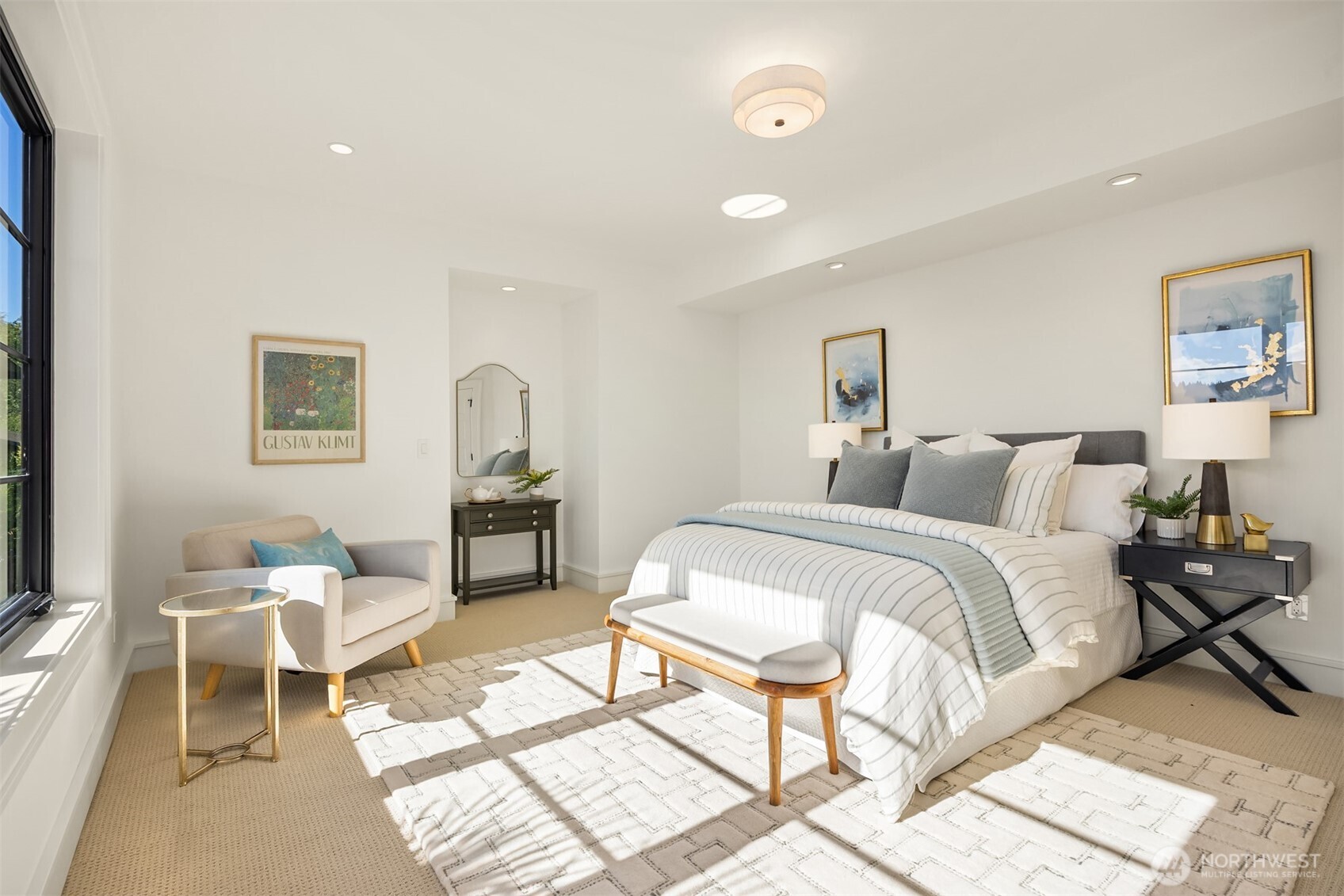 4869 Rosalind Road Northeast Bainbridge Island, WA 98110 - Photo 31 of 40 a bedroom with a bed and a chair