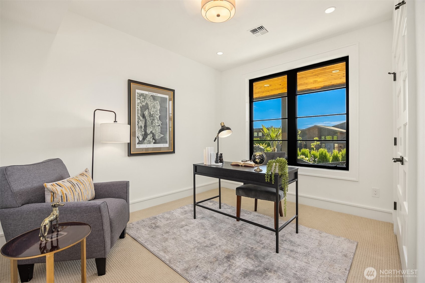 4869 Rosalind Road Northeast Bainbridge Island, WA 98110 - Photo 33 of 40 a living room with furniture and a window