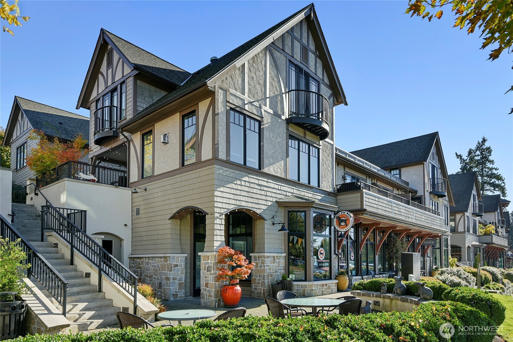 4869 Rosalind Road Northeast Bainbridge Island, WA 98110 - Photo 38 of 40 a front view of a house with garden
