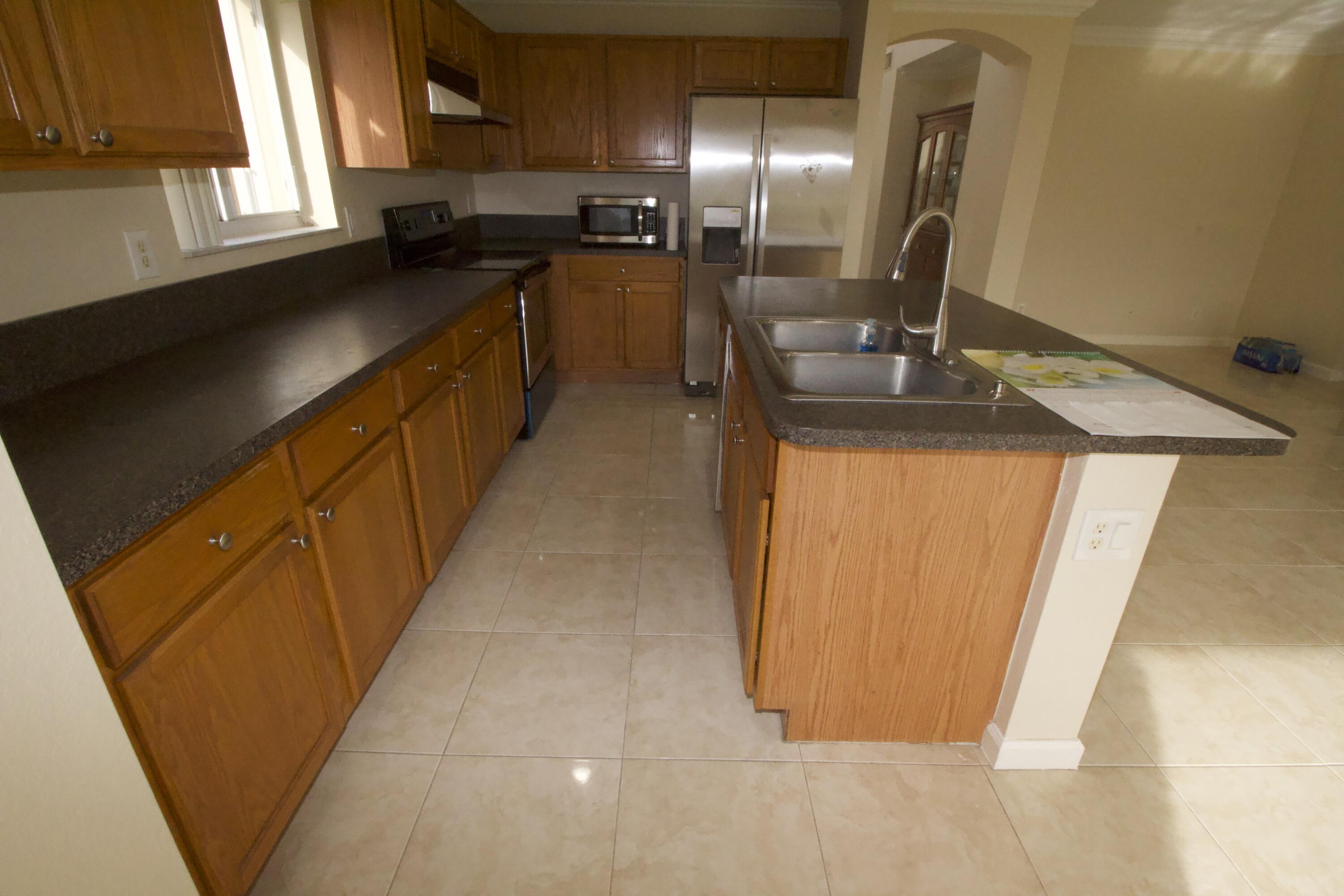 4014 Rocks Point Place Riviera Beach, FL 33407 - Photo 5 of 48 IMG_6251