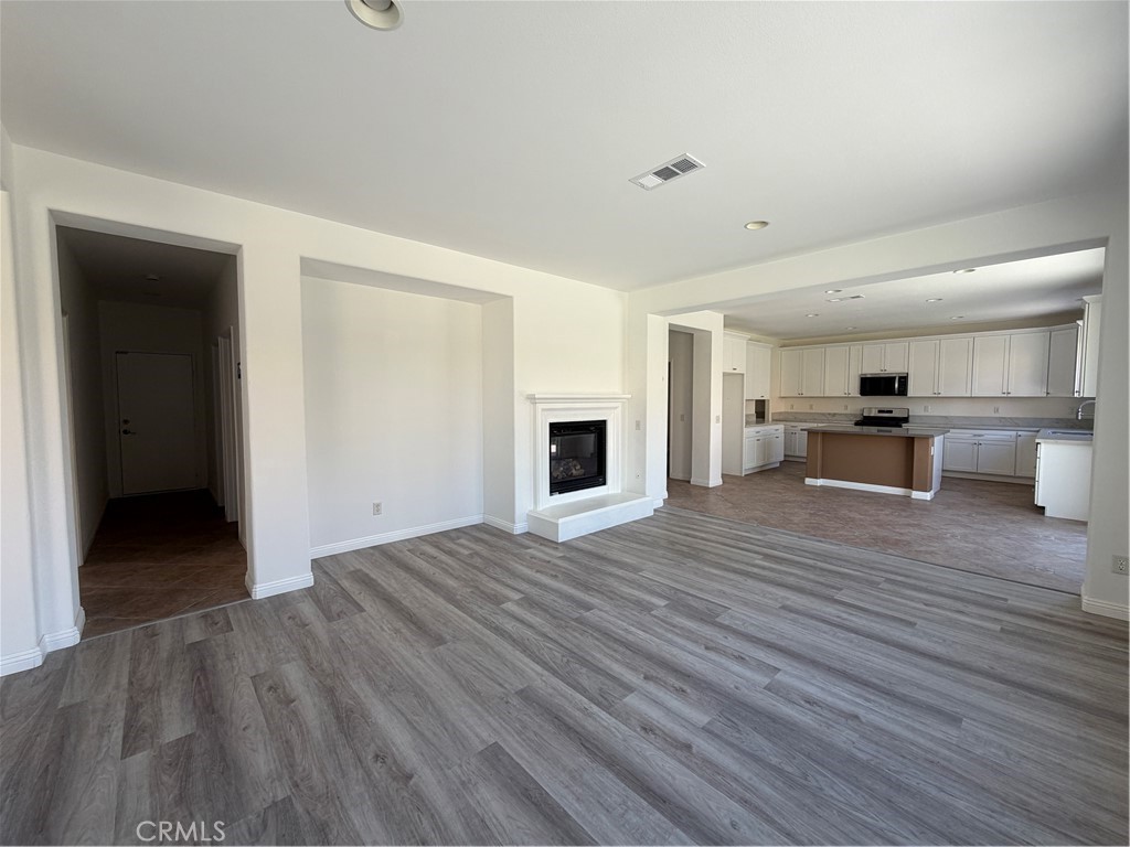 6179 Cedar Creek Road Eastvale, CA 92880 - Photo 9 of 36 1st Floor Family Room & Kitchen