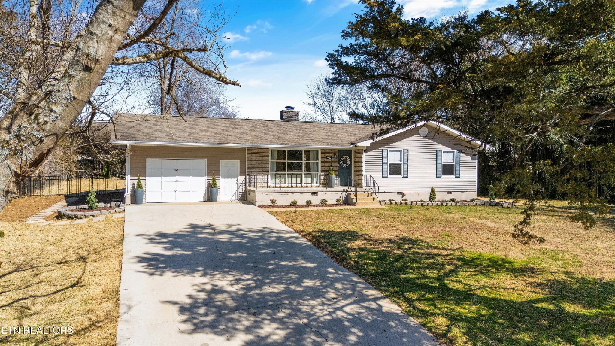 4912 Spring Creek Road Knoxville, TN 37920 - Photo 1 of 29 a view of a house with snow on the ground