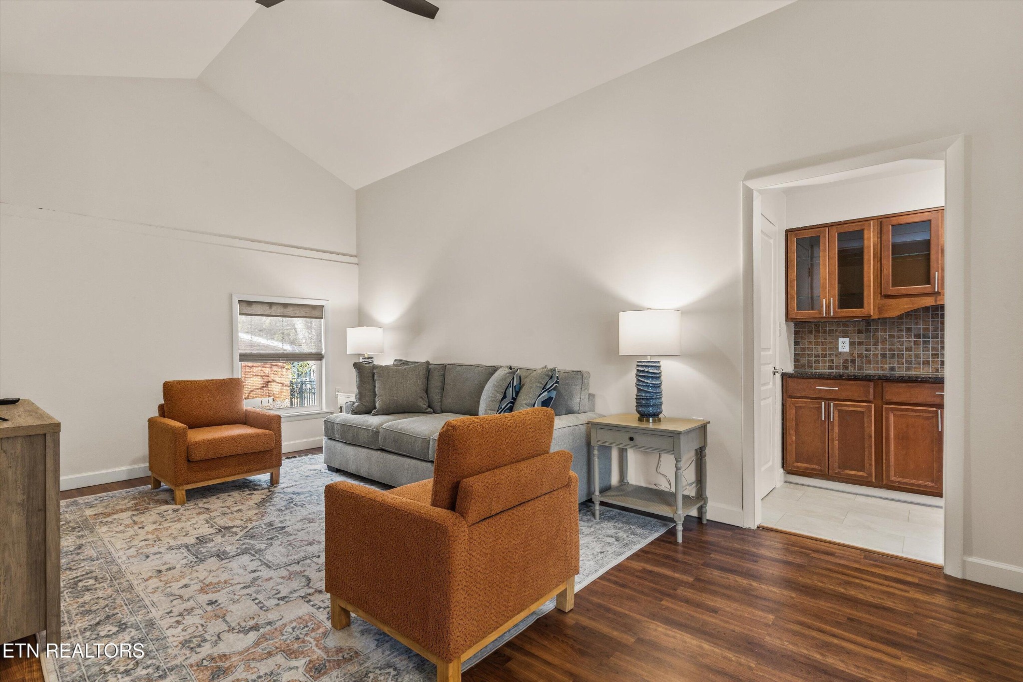 4912 Spring Creek Road Knoxville, TN 37920 - Photo 18 of 29 a living room with furniture and a wooden floor