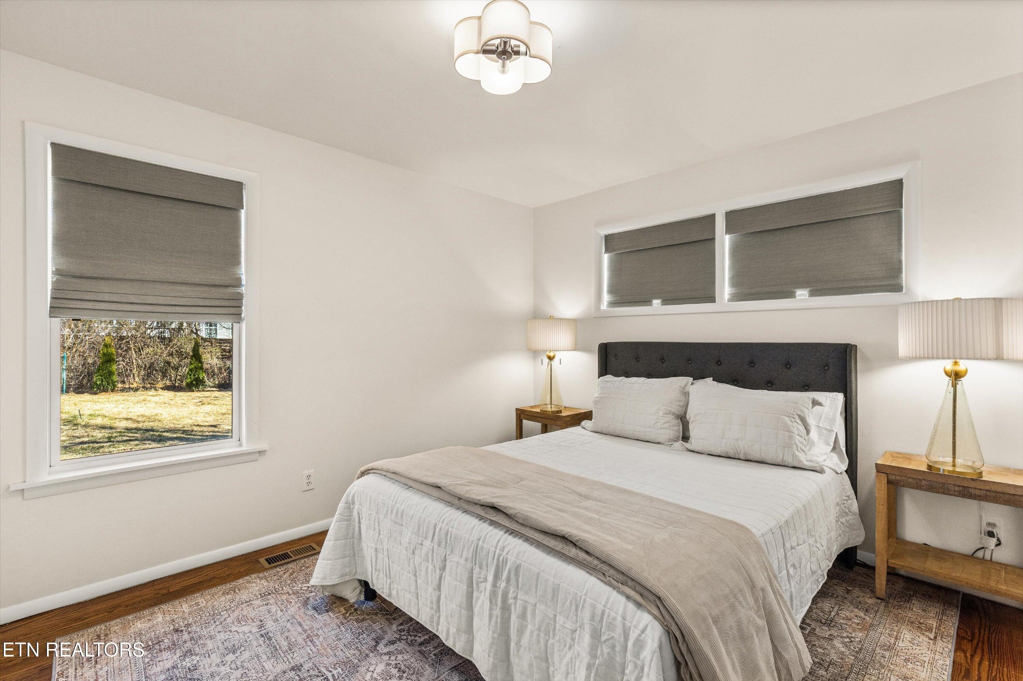 4912 Spring Creek Road Knoxville, TN 37920 - Photo 19 of 29 a bedroom with a bed and a window