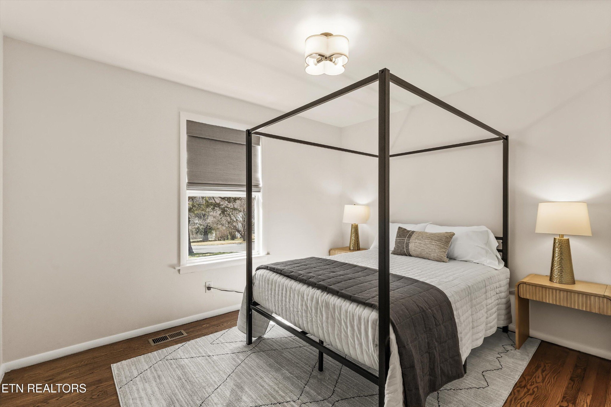 4912 Spring Creek Road Knoxville, TN 37920 - Photo 22 of 29 a bedroom with a bed and a window